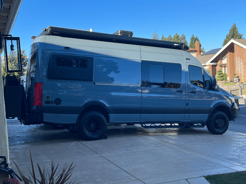 Starlink dish installed on a Sprinter van, offering mobile internet for travel and remote work.